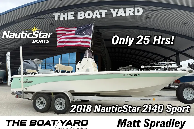 The Image of 2018 NauticStar 2140 Sport boat at The Boat Yard with American flag, only 25 hours. - 1