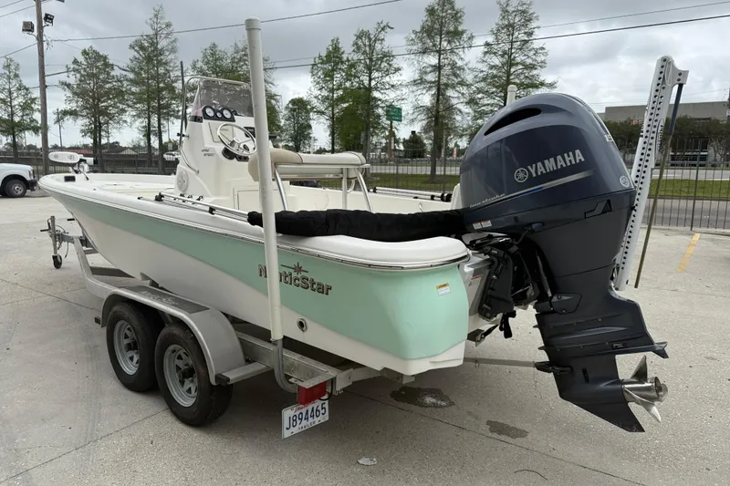 Slide: The Image of 2018 NauticStar 2140 Sport boat with Yamaha engine on trailer. - 4