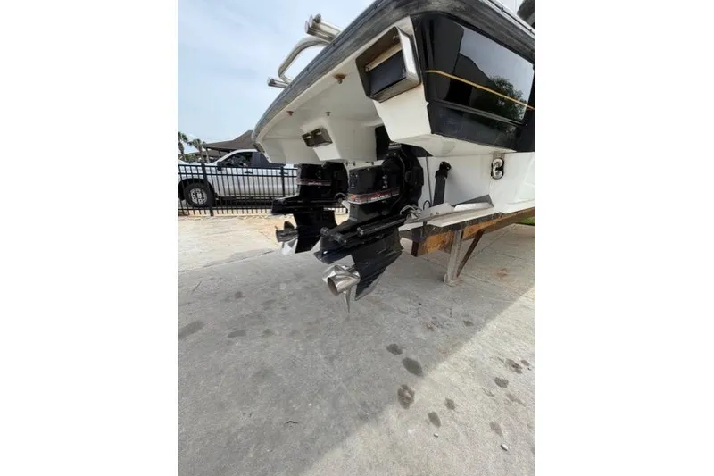 Slide: The Image of 1989 Formula 292 SR-1 boat stern with dual propellers on a trailer. - 10