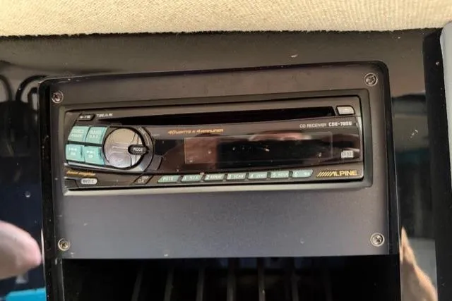 Slide: The Image of Alpine CD receiver in a 1989 Formula 292 SR-1 boat dashboard. - 17