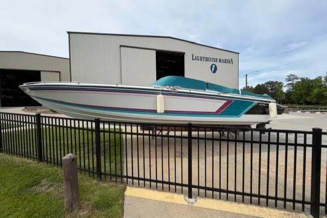 Slide: The Image of 1989 Formula 292 SR-1 boat at Lighthouse Marina, displayed on a trailer. - 20