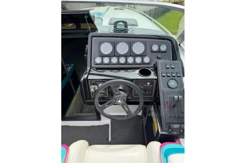 Slide: The Image of 1989 Formula 292 SR-1 boat dashboard with steering wheel and instrument panel. - 5