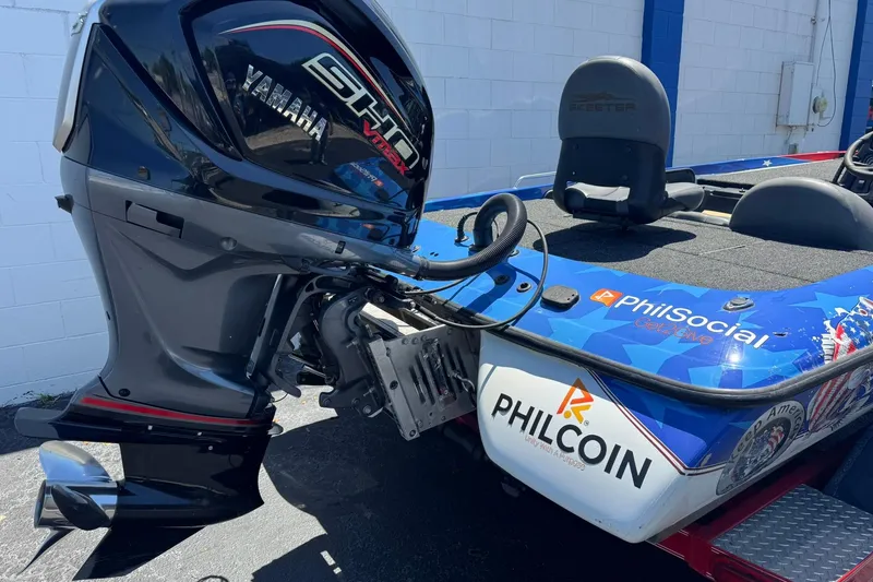 Slide: The Image of 2005 Skeeter ZX225 boat with Yamaha VMAX engine, featuring Philcoin branding. - 7