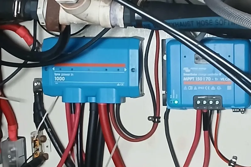 Slide: The Image of Electrical components and wiring inside a 1982 Morgan 416 boat. - 31