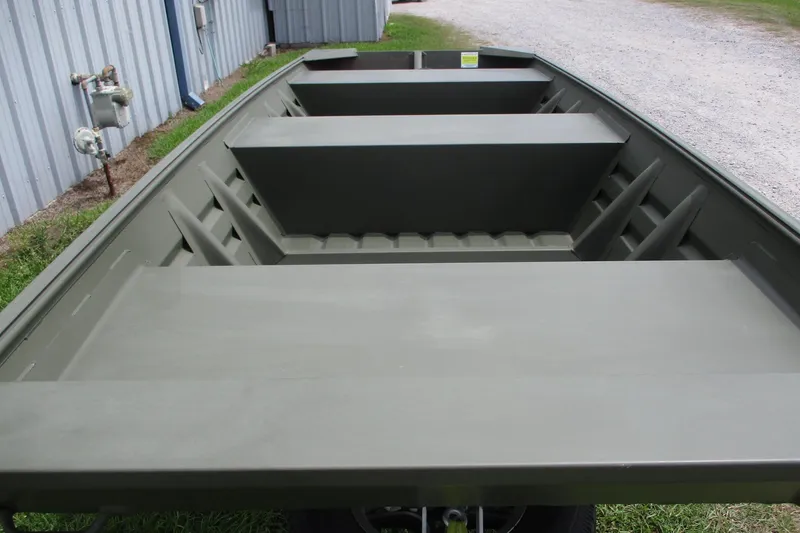 Slide: The Image of 2025 Alweld 1442 Flat Bottom boat, interior view, showing seating and storage layout. - 2