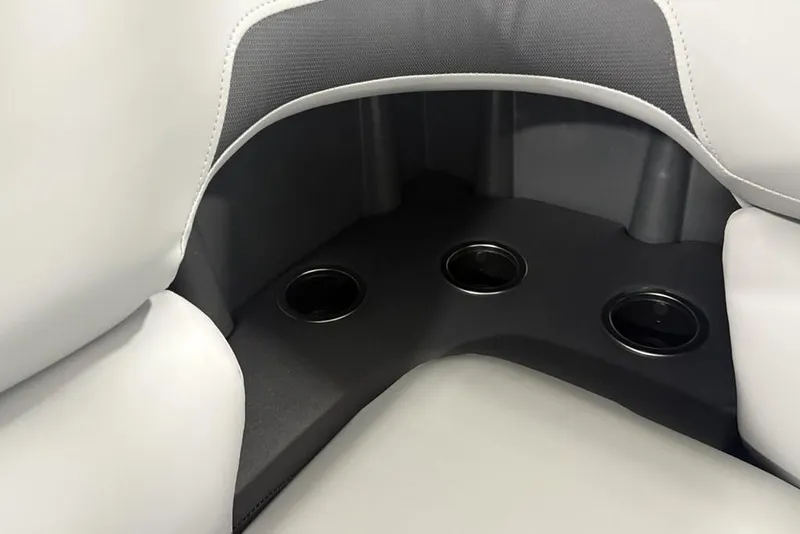 Slide: The Image of 2026 Sun Tracker SportFish 20 DLX boat seating with integrated cup holders. - 21