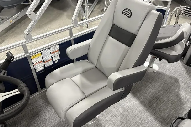 Slide: The Image of 2026 Sun Tracker SportFish 20 DLX boat seat, featuring gray and black upholstery. - 22