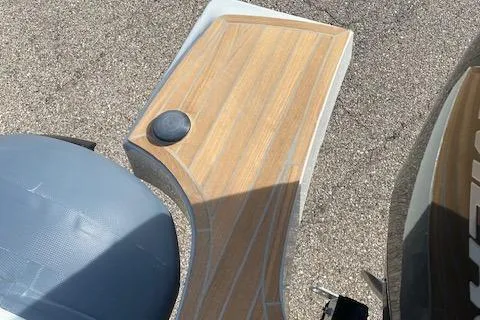 Slide: The Image of Close-up of 2022 SACS Strider 900 boat deck with wood finish. - 14