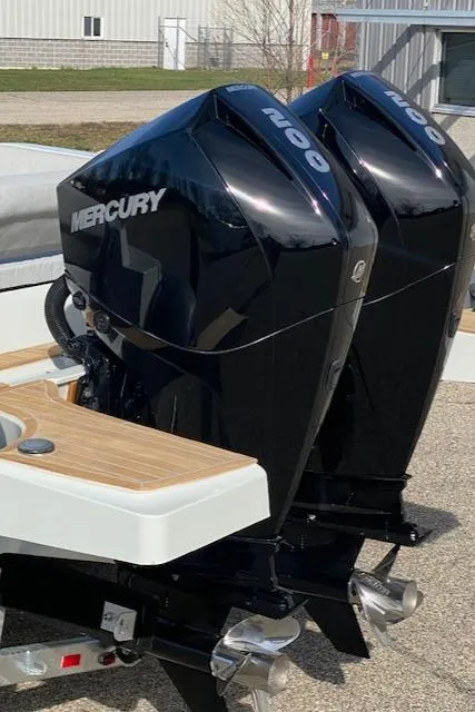 Slide: The Image of Twin Mercury outboard engines on a 2022 SACS Strider 900 boat. - 15