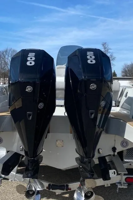 Slide: The Image of Twin 300 HP engines on a 2022 SACS Strider 900 boat. - 16