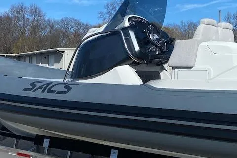 Slide: The Image of 2022 SACS Strider 900 boat with sleek design and modern console. - 17