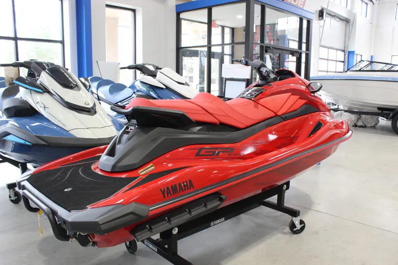 The Image of 2026 Yamaha WaveRunner GP SVHO in showroom, vibrant red color, side view. - 0