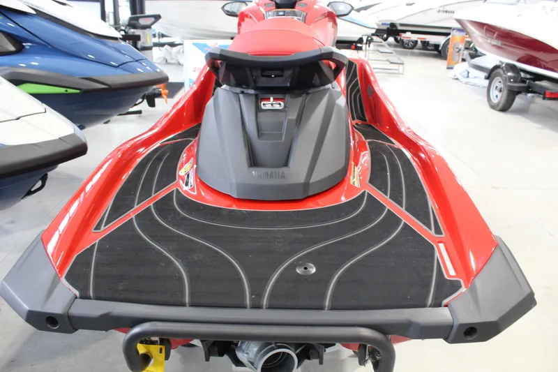 Slide: The Image of 2026 Yamaha WaveRunner GP SVHO in showroom, rear view, red and black design. - 3