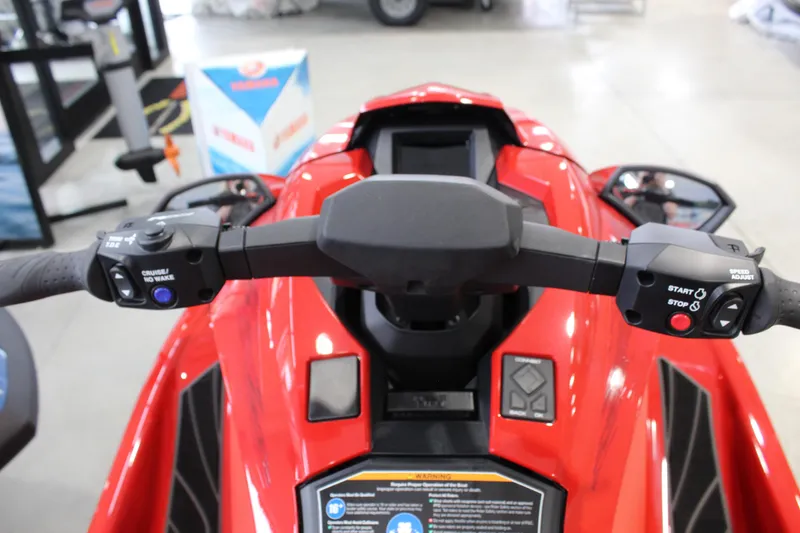 Slide: The Image of 2026 Yamaha WaveRunner GP SVHO handlebars, featuring control buttons and sleek red design. - 4