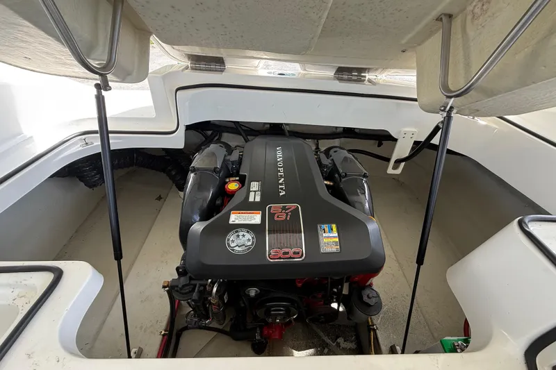 Slide: The Image of Engine compartment of a 2011 Cobalt 232 boat with Volvo Penta engine. - 12