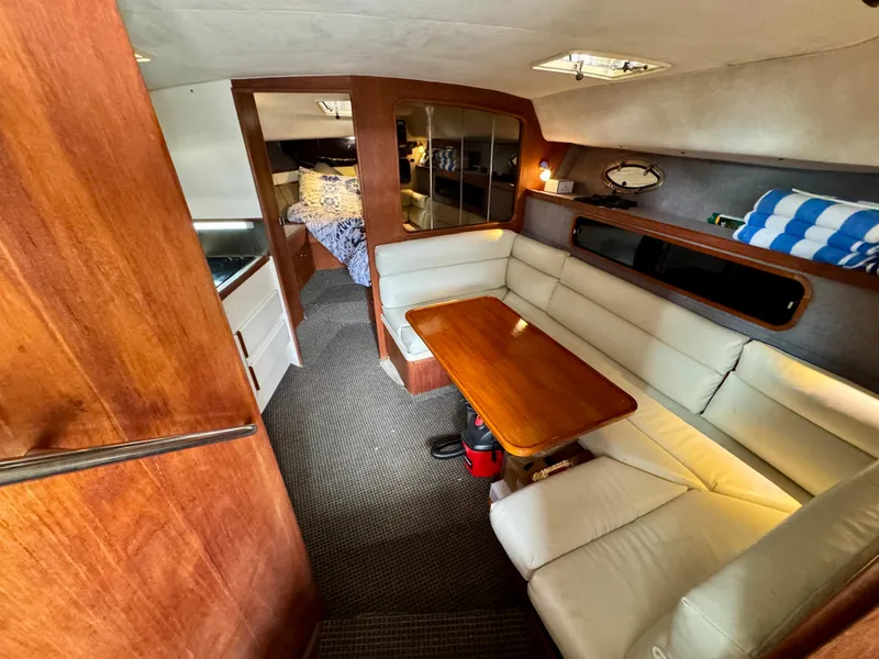 Slide: The Image of 1988 Tiara Yachts 3100 Open sink with wooden cover and faucet. - 15