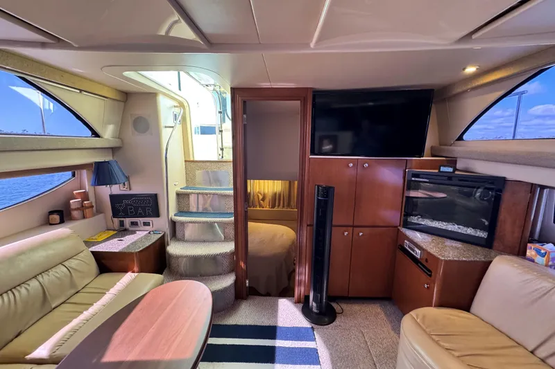 Slide: The Image of Luxurious interior of 2005 Meridian 368 Motoryacht with modern amenities and cozy seating. - 15