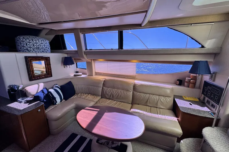 Slide: The Image of Luxurious interior of 2005 Meridian 368 Motoryacht with leather seating and ocean view. - 17