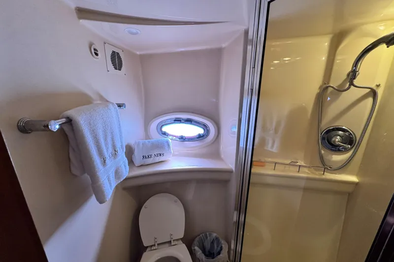 Slide: The Image of Bathroom interior of 2005 Meridian 368 Motoryacht with shower and porthole window. - 25