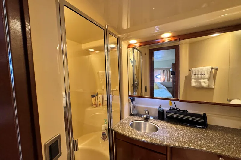 Slide: The Image of Luxurious bathroom in a 2005 Meridian 368 Motoryacht with shower and vanity. - 32
