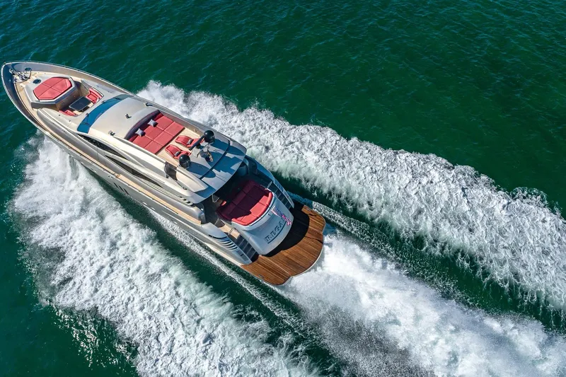 Slide: The Image of Luxurious 2008 Pershing 90 yacht cruising on open water, aerial view. - 10