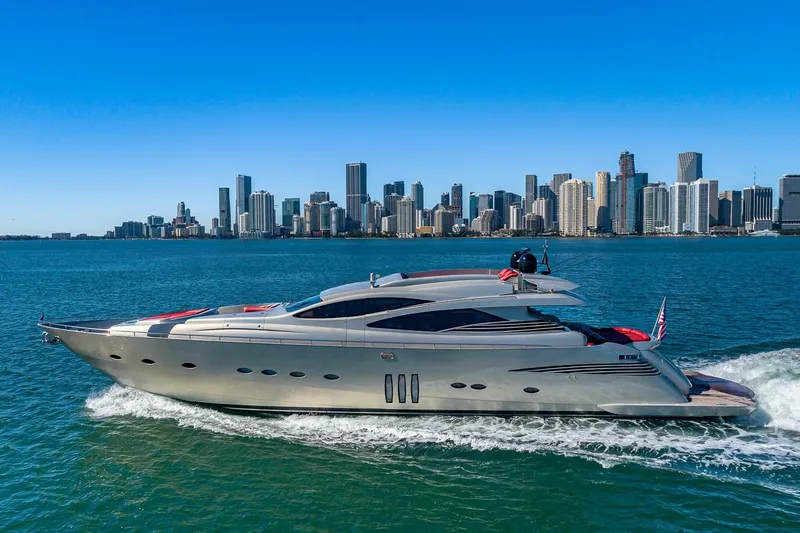 Slide: The Image of 2008 Pershing 90 yacht cruising near city skyline on a sunny day. - 3