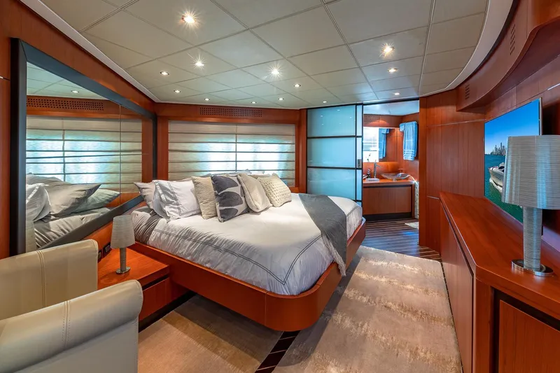 Slide: The Image of Luxurious bedroom interior of 2008 Pershing 90 yacht with modern design and elegant furnishings. - 35