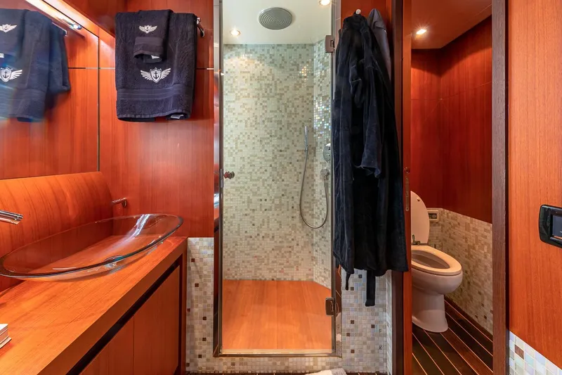 Slide: The Image of Luxurious bathroom on 2008 Pershing 90 yacht with glass sink and modern shower. - 41