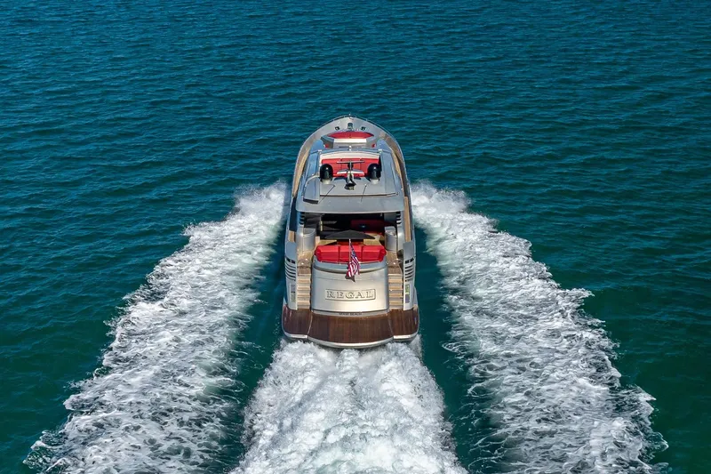 Slide: The Image of Luxury 2008 Pershing 90 yacht cruising on open blue waters. - 8