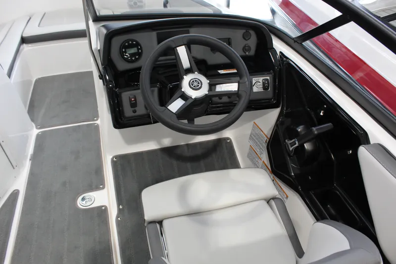 Slide: The Image of 2025 Yamaha Boats SX190 cockpit with steering wheel and dashboard controls. - 3