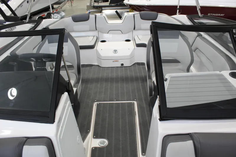Slide: The Image of 2025 Yamaha Boats SX190 interior with modern seating and sleek design. - 6