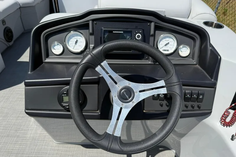 Slide: The Image of Steering console of 2023 Bentley Pontoons 220 SWINGBACK with gauges and controls. - 7