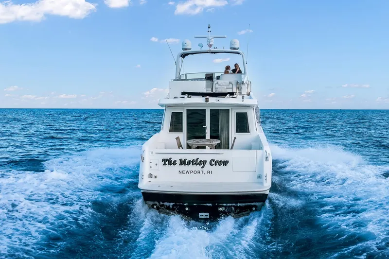 Slide: The Image of Navigator Rival 5700 yacht cruising on open sea, 2003 model, Newport, RI. - 10