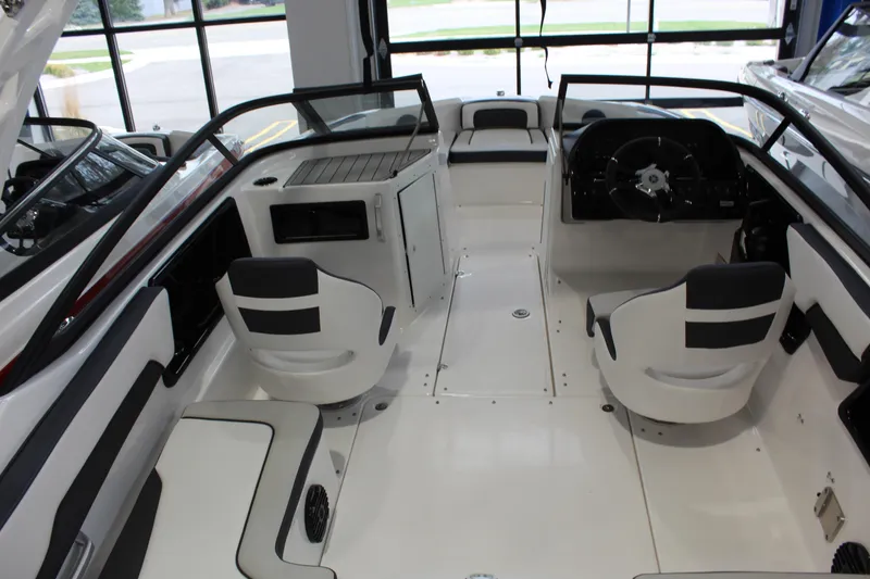 Slide: The Image of 2026 Yamaha Boats 195S interior with sleek seating and modern dashboard design. - 4