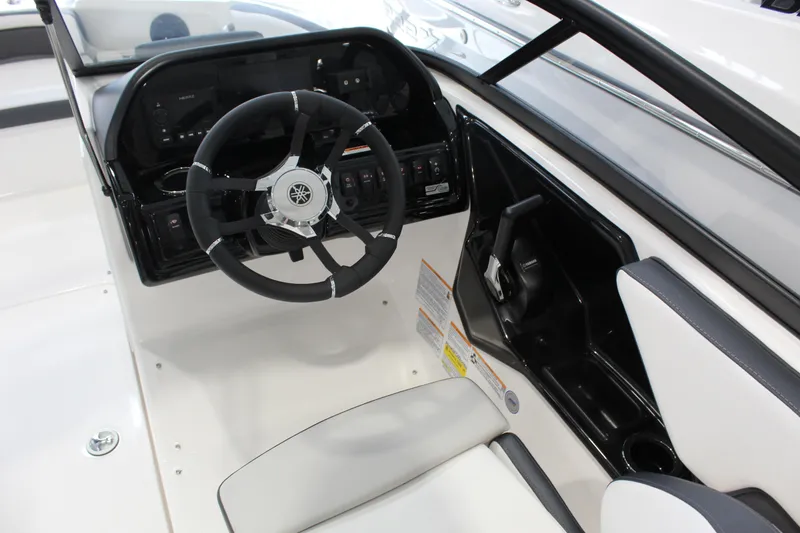 Slide: The Image of 2026 Yamaha Boats 195S cockpit with steering wheel and control panel. - 5