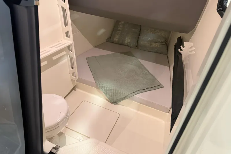 Slide: The Image of Cozy cabin interior of 2027 Navan T30 boat with bed and toilet. - 18