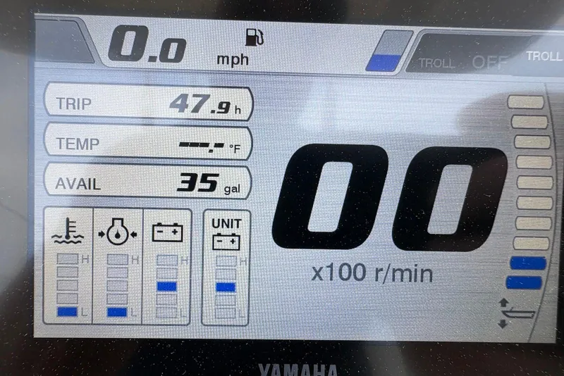 Slide: The Image of Digital display of a 2022 Cobia 220 Center Console boat showing trip, temperature, and fuel data. - 9