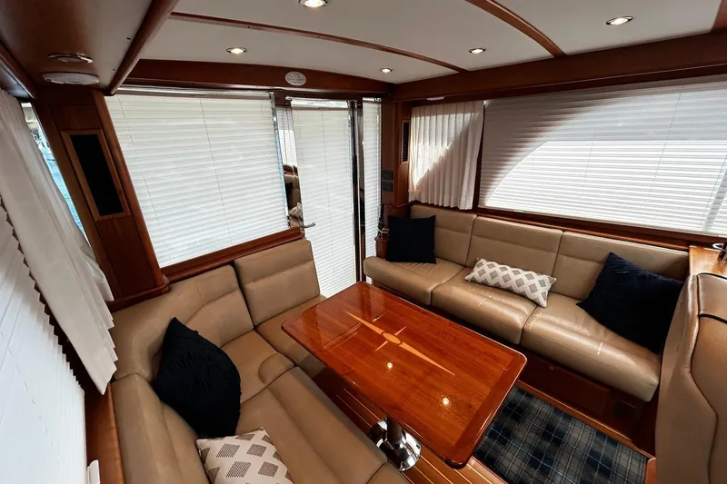 Slide: The Image of Luxurious interior of 2021 Sabre 45 Salon Express yacht with elegant seating and wooden table. - 12