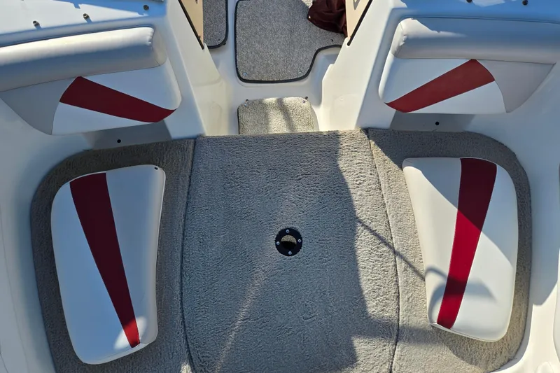 Slide: The Image of Interior of 2007 Glastron GT 205 Ski & Fish boat with red and white seating. - 19