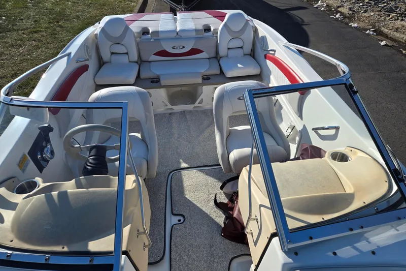 Slide: The Image of 2007 Glastron GT 205 Ski & Fish boat interior with seating and steering wheel. - 20