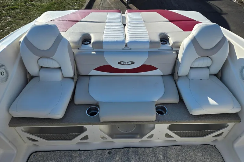 Slide: The Image of 2007 Glastron GT 205 Ski & Fish boat interior with white and red seating. - 22