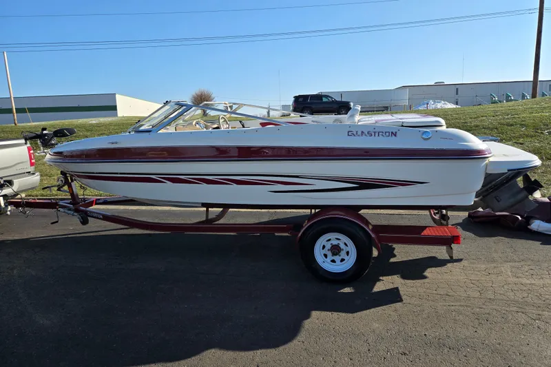 Slide: The Image of 2007 Glastron GT 205 Ski & Fish boat on trailer, parked outdoors. - 4