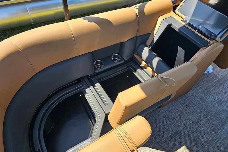 Slide: The Image of 2026 Bentley Pontoons Legacy 200 Navigator interior seating with storage compartments. - 14