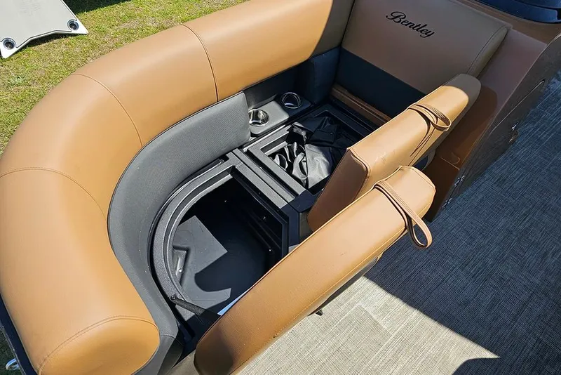 Slide: The Image of 2026 Bentley Pontoons Legacy 200 Navigator interior seating with storage compartment. - 19