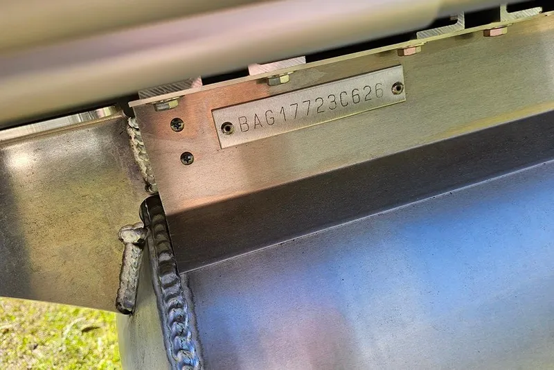 Slide: The Image of 2026 Bentley Pontoons Legacy 200 Navigator hull identification number plate close-up. - 22