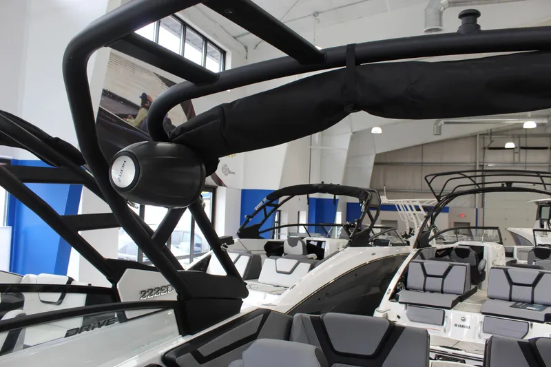 Slide: The Image of 2026 Yamaha Boats 222XD interior with sleek design and modern features in showroom. - 10