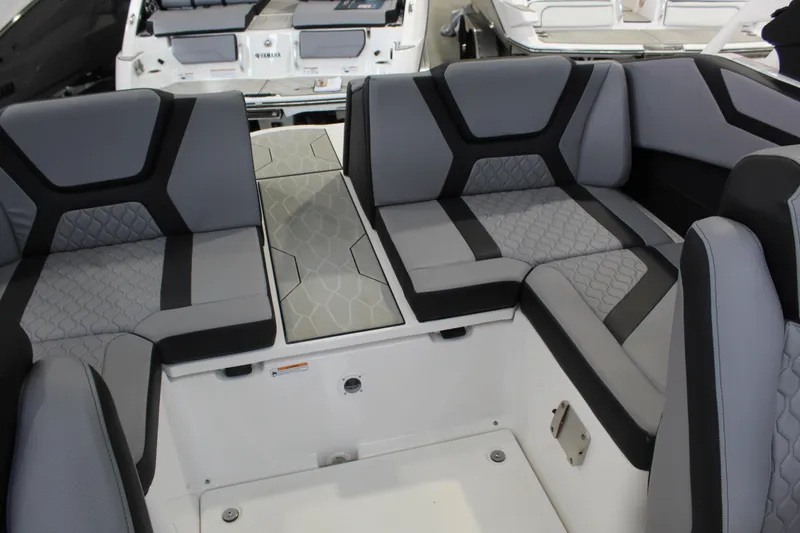 Slide: The Image of 2026 Yamaha Boats 222XD interior with modern gray seating and sleek design. - 11