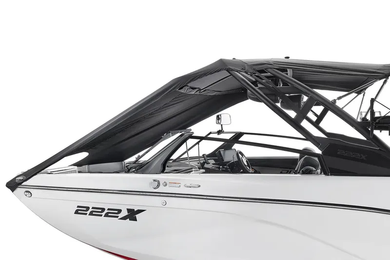 Slide: The Image of Manufacturer Provided Image: 2026 Yamaha Boats 222XD, sleek design with black canopy and modern dashboard. - 16