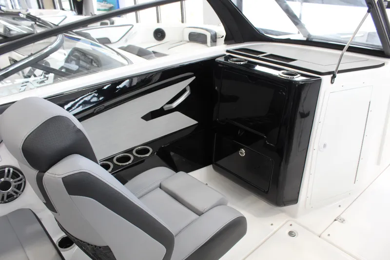 Slide: The Image of Interior of 2026 Yamaha Boats 222XD, featuring sleek seating and modern console design. - 5