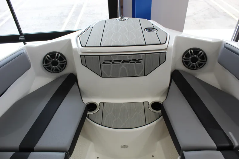 Slide: The Image of 2026 Yamaha Boats 222XD interior with sleek seating and modern speaker system. - 7